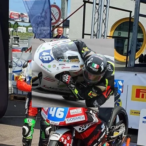 Matteo Masili nel paddock accanto alla sua Moto3 numero 46
